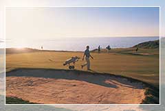 The sun setting on the 13th green.